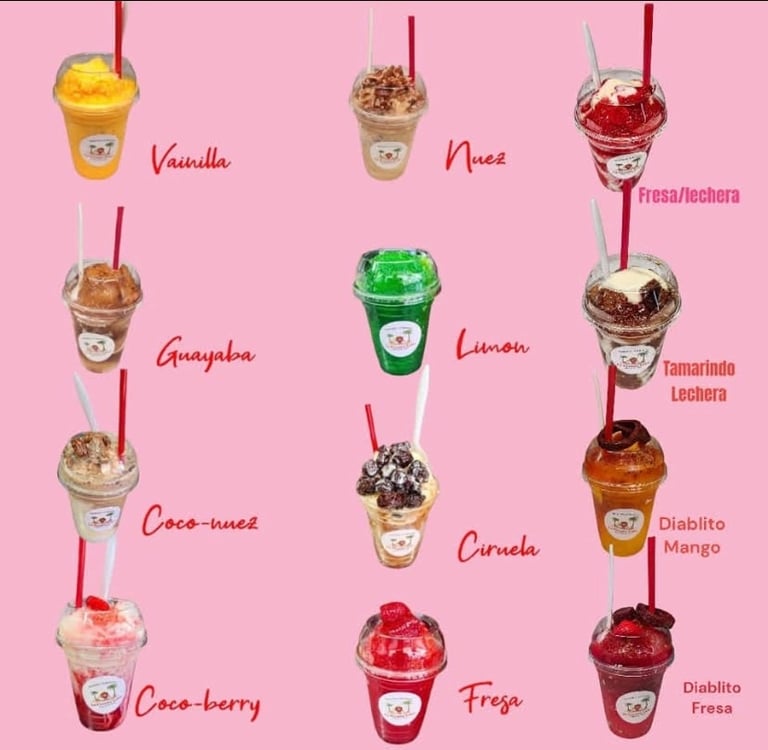 Menu of colorful frappuccino drinks displayed on pink background with flavor names including Vanilla, Nuez, Fresa/Lechera, Guayaba, Limon, Tamarindo Lechera, Coco-nuez, Curmela, Diablito Mango, Coco-berry, Fresa, and Diablito Fresa